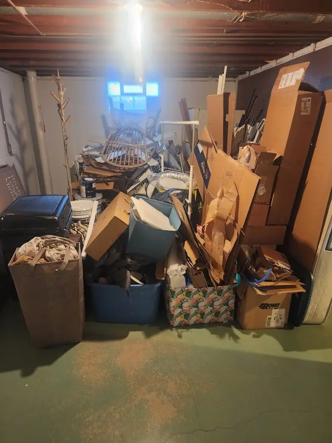 Roll-off dumpster container at job site for 15 Yard Dumpster Rental in Gillespie